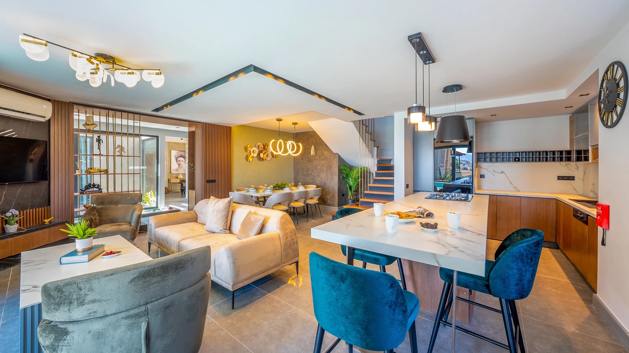 Spacious open-plan living area with integrated kitchen, dining, and lounge zones.